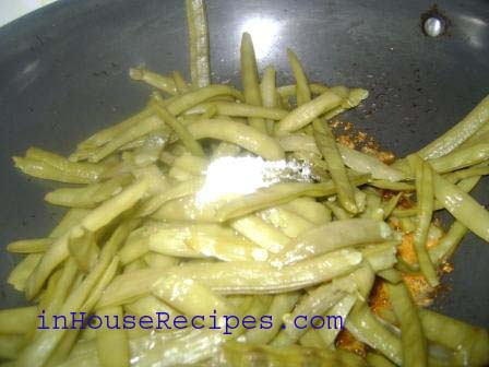 After mixing the spices well in oil, add boiled cluster beans
